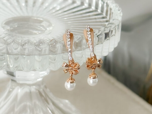 pozłacane kolczyki perłowa kokardka